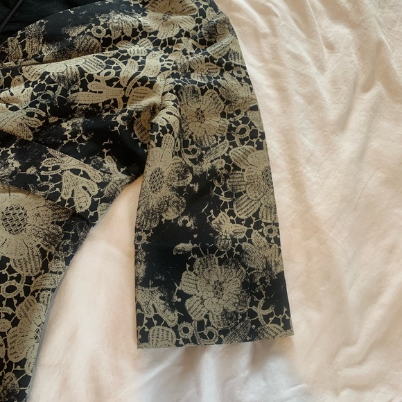 Brand: Alexander McQueen
Category: Dress. Colors: Black and Gold flowers - Picture 10 of 11